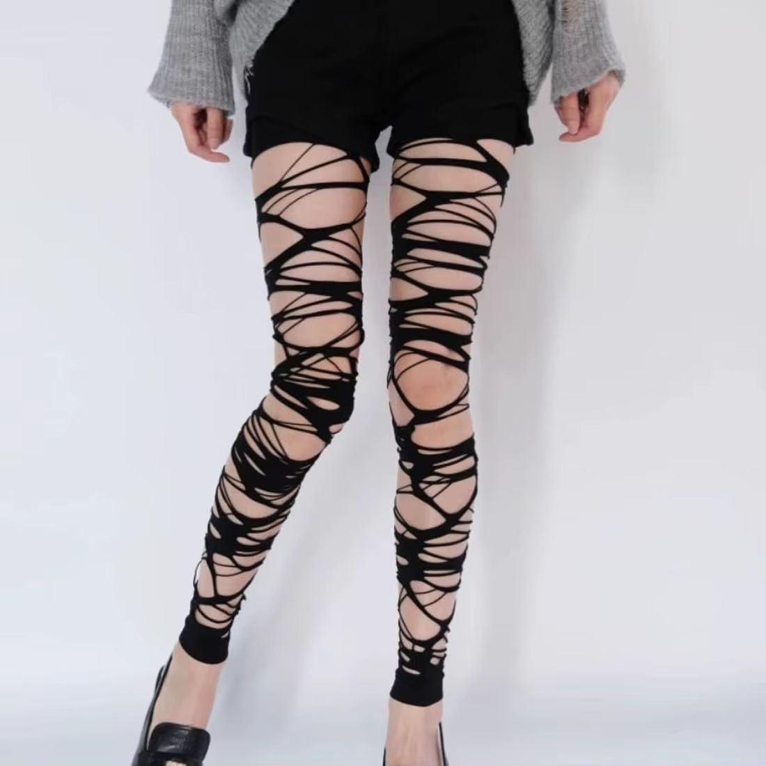 Collants résille déchirés noirs Sexy pour femmes