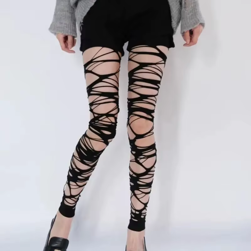 Collants résille noirs déchirés pour femme